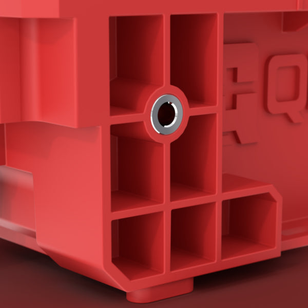 Vista frontal de la caja cerrada con asa de transporte ergonómica