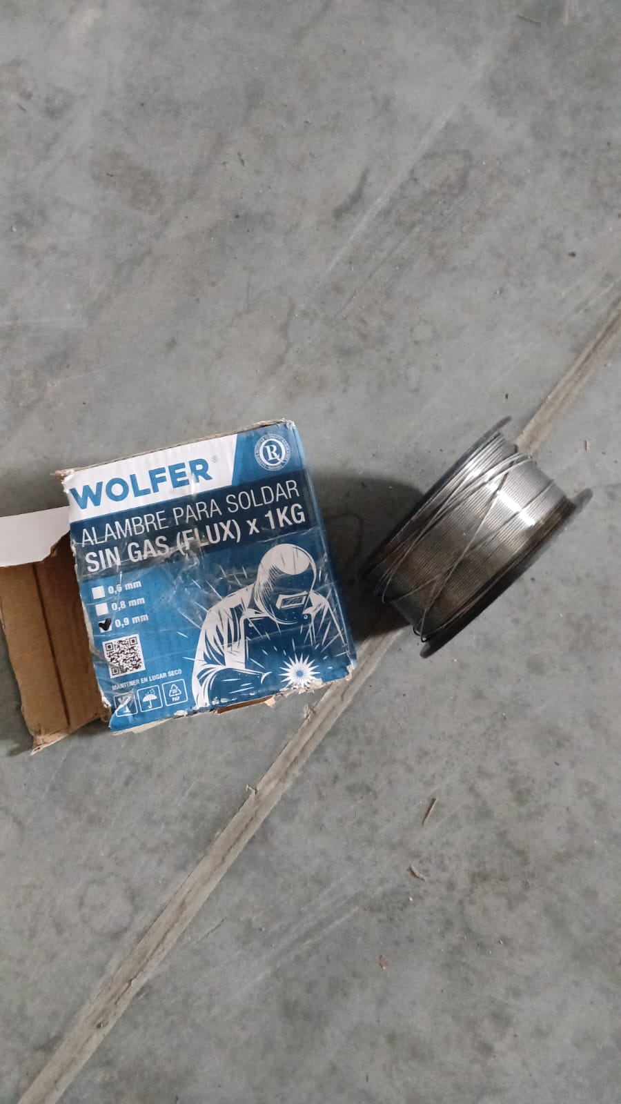 Alambre para Soldar MIG FLUX Sin Gas 0.9mm 1Kg Wolfer - Reacondicionado