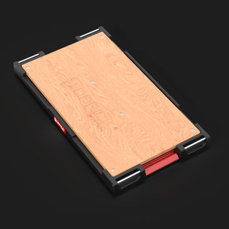 Mesa Qbrick en uso profesional de taller con herramientas y accesorios